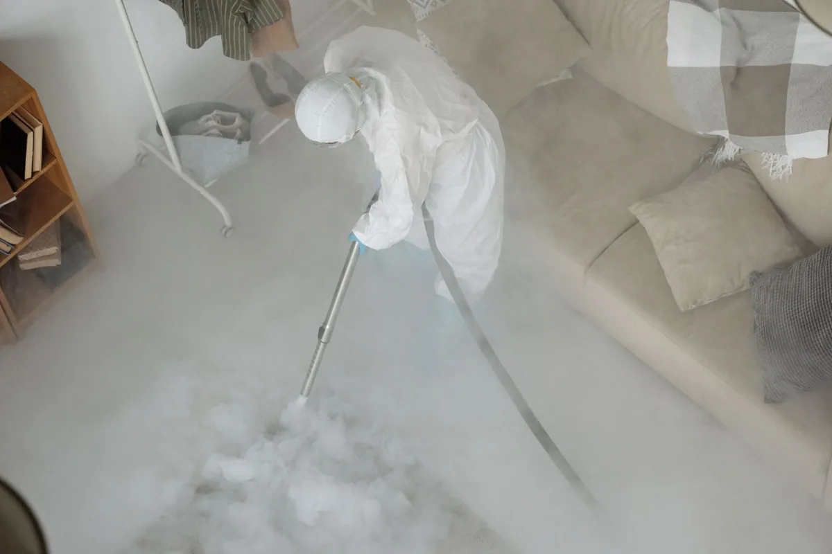 Biohazard cleanup technician in protective equipment, Los Gatos, CA